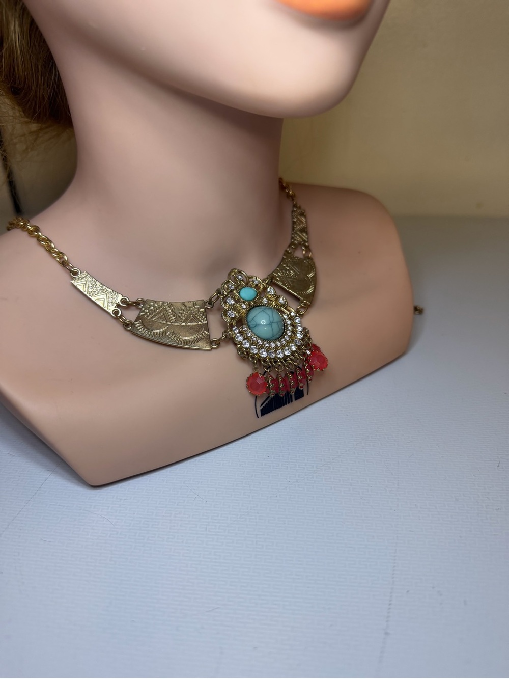 Gold-Tone Statement Necklace with Turquoise Center and Coral Drops